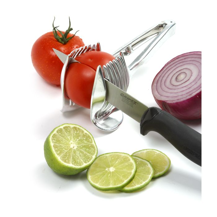 front view of tomato slicer with tomato in it.