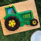 tractor shaped cake with icing.