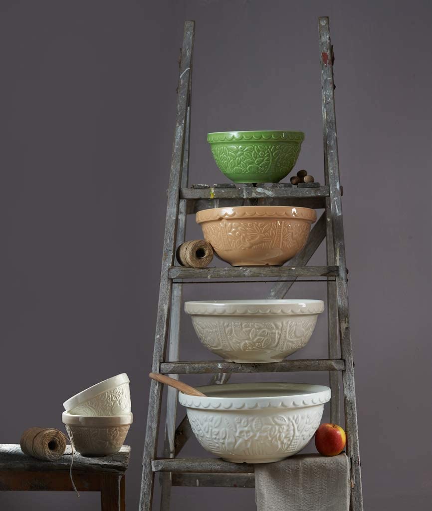 bowls on ladder shelf on grey background.