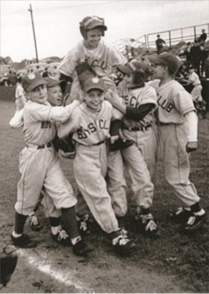 front of card is a photograph of young boys celebrating a baseball game in uniform