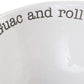 close up view of the text "guac and roll"