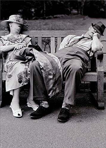 front of card is a black and white photo of a couple with their hats covering their eyes while they sleep