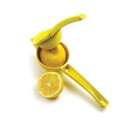 half a lemon inside lemon squeezer.