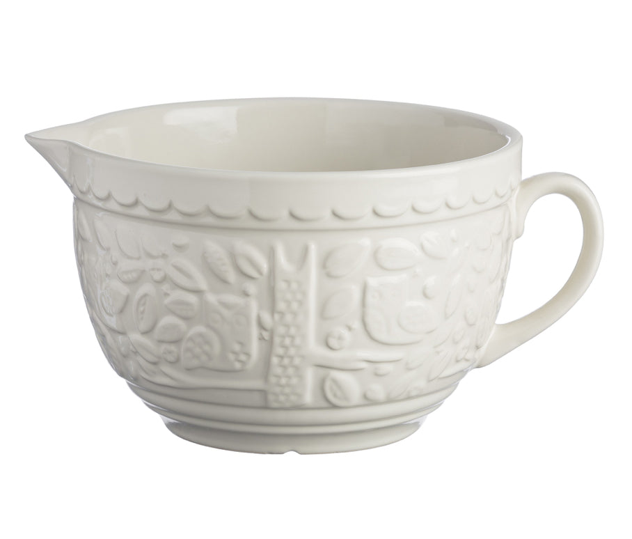 batter bowl with handle and pouring spout on white background.