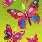 front of card is a drawing of butterflies with birthday candles as the bodies of the butterflies