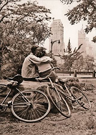 front of card is a photograph of a couple in the park