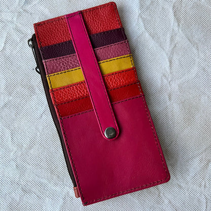 card holder with colorful card slots, snap tab, and side zipper pocket.