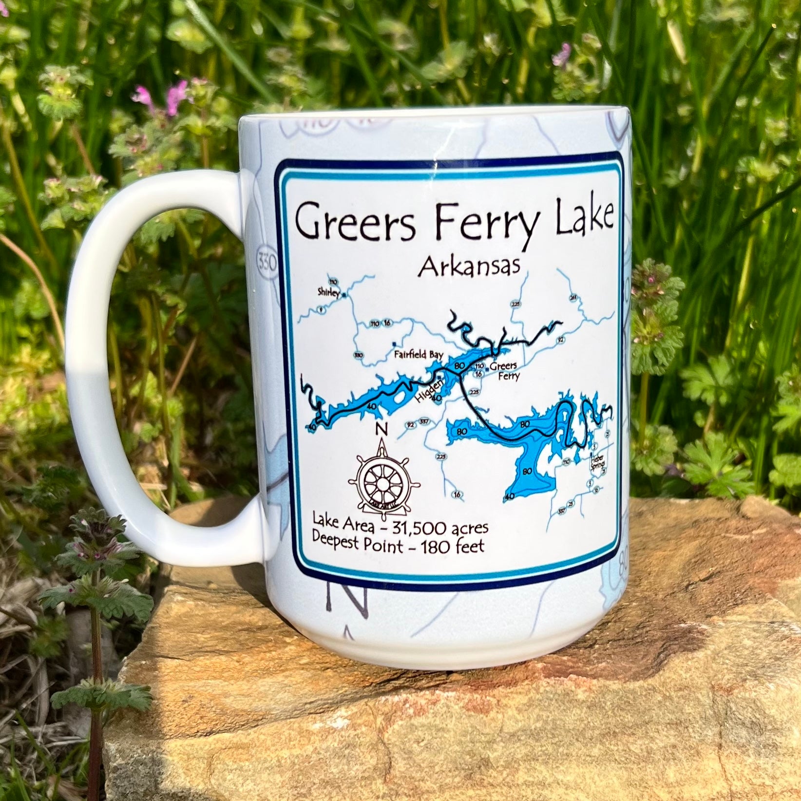 white mug with map of greers ferry lake printed on it.