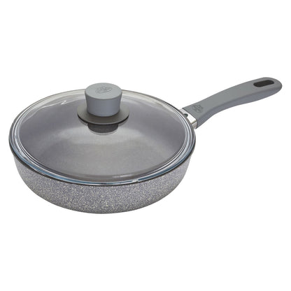 sautee pan with lid on white background