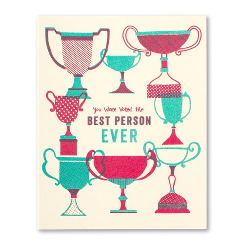 front of card is drawing of many trophies and front text 