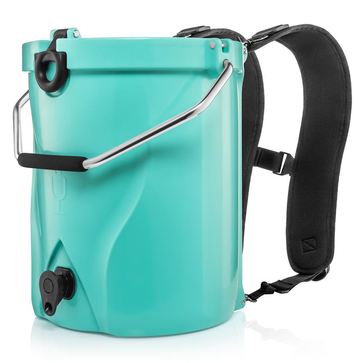 side view of aqua backtap backpack cooler with straps on a white background