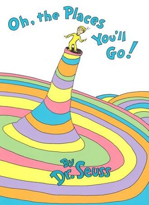 front cover of book has illustration of a boy standing on a pillar of rainbow colors, title, and authors name