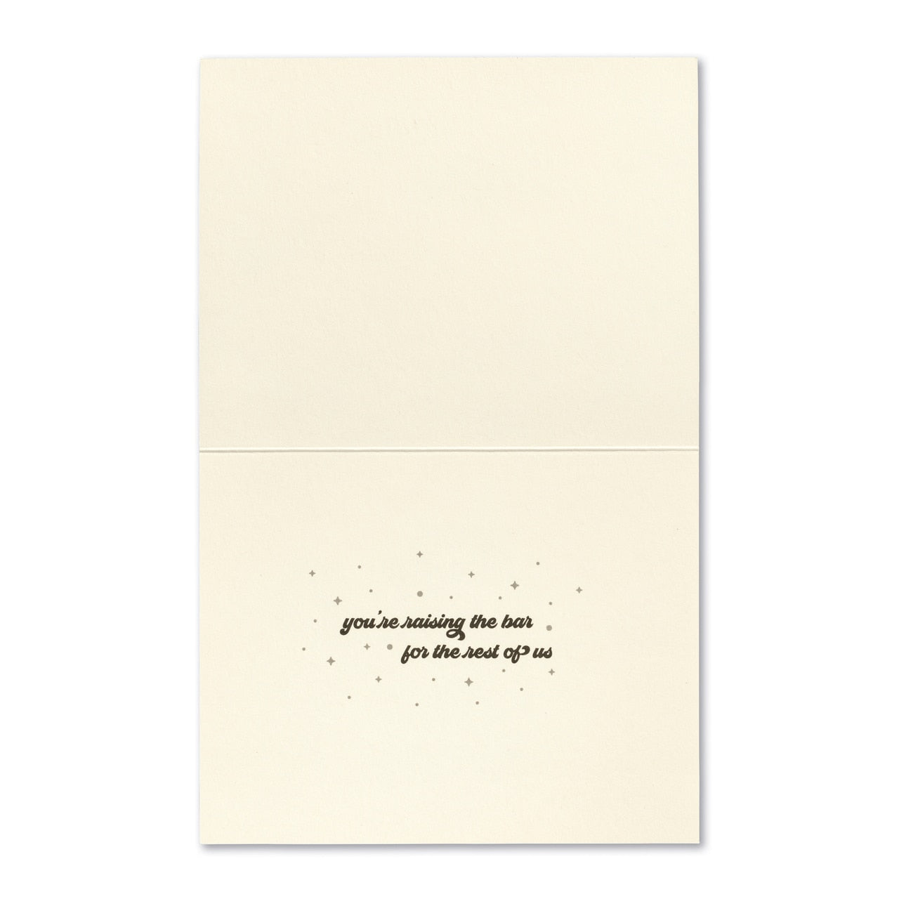 inside card is cream with inside text in black with stars