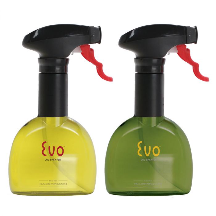 one yellow and one green oil sprayer bottles on a white background