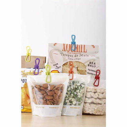 illustration of the multi purpose clips on several bags on a white background