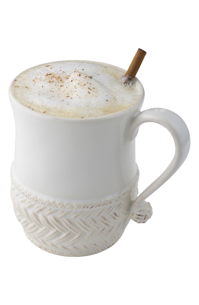 Le Panier Whitewash Ceramic Mug fukked with cream topped beverage and a cinnamon stick.