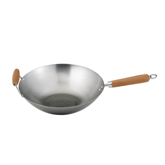 the carbon steel wok on a white background