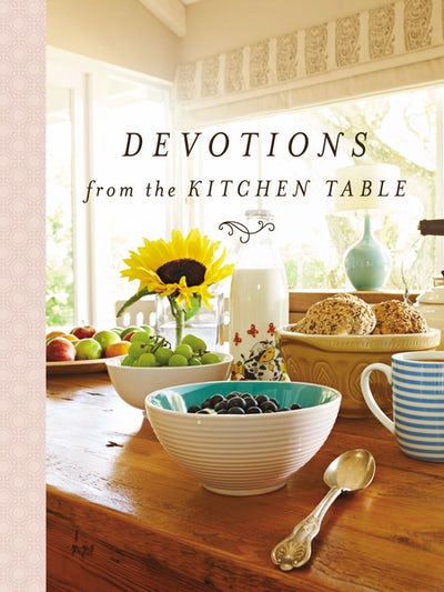 cover of book is a kitchen table with bowls of food and title