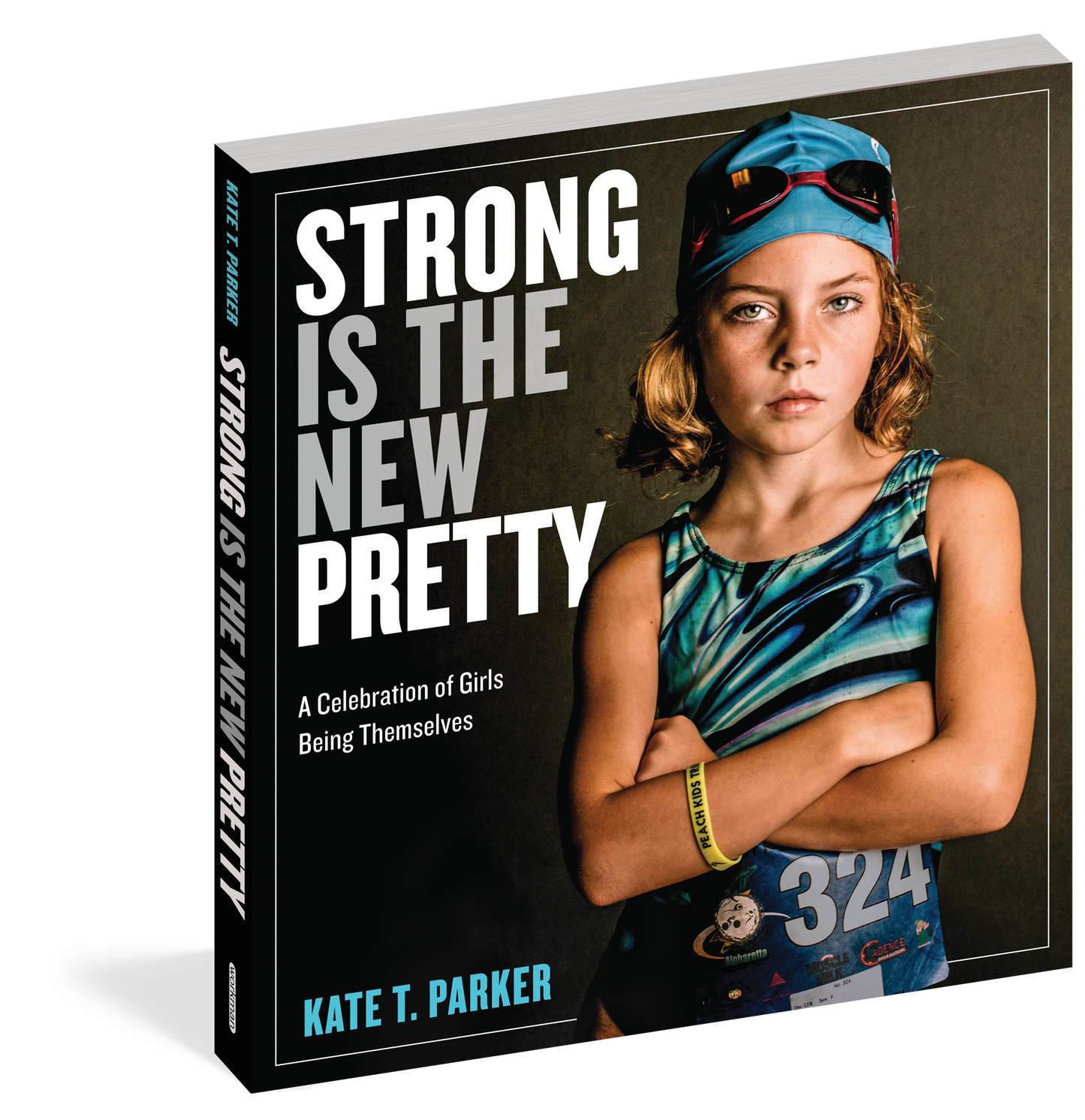 front cover of book has picture of a girl standing with her arms crossed and wearing a swim cap, goggle, and swim suit, title and author's name