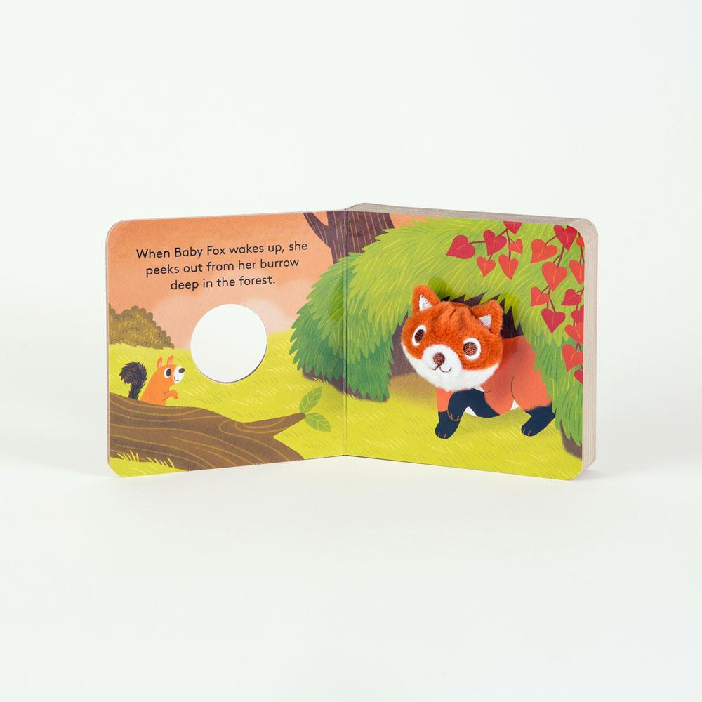 inside view with test and illustration of baby fox coming out of den and a baby squirrel in the forest