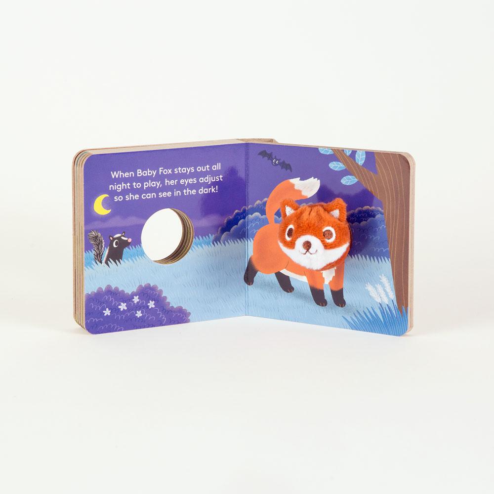 inside view with text and illustration of baby fox at night with a skunk in the forest
