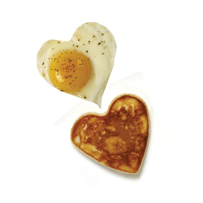 heart shaped fried egg and pancake.
