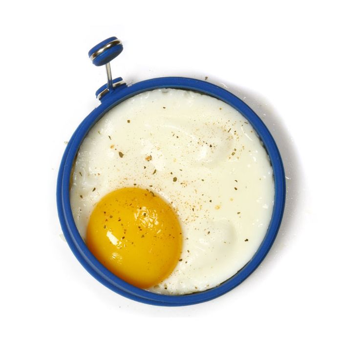 fried egg inside pancake ring.
