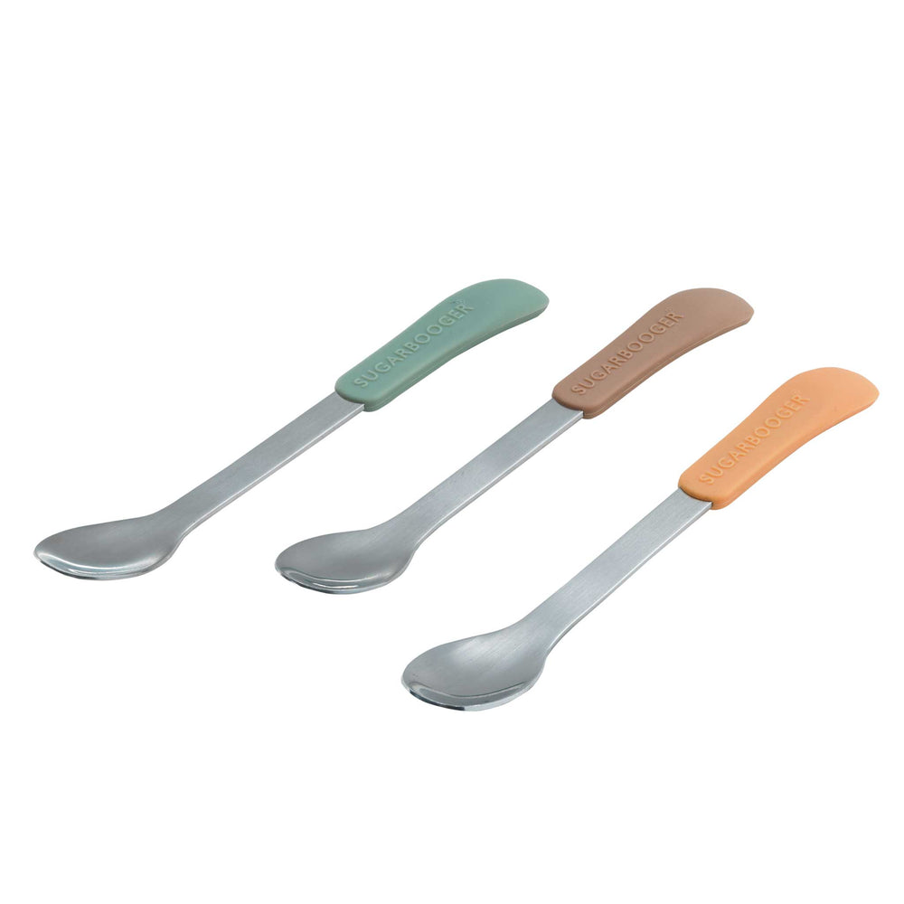 3 stainless steel spoons with silicone handles that are solid green, brown, or orange.