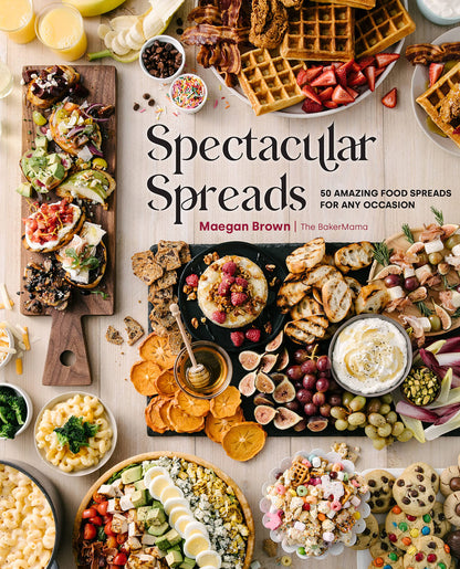 cover of book is a picture of a large food spread, title, and authors name