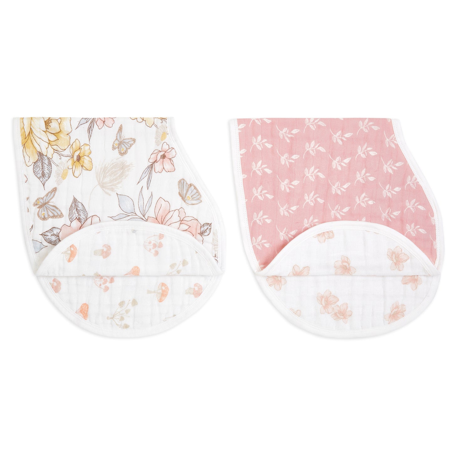 two earthly burpy bibs on a white background