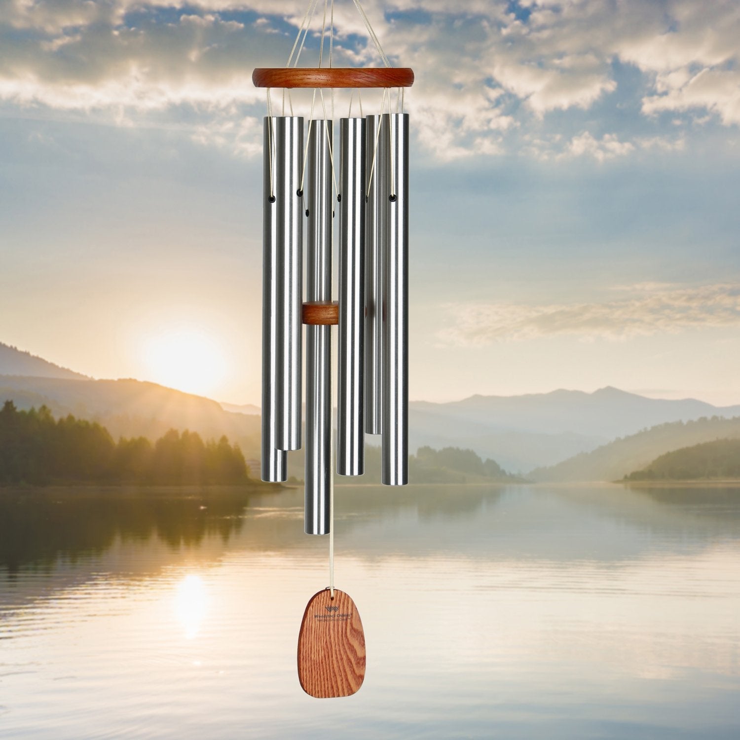 chime with mountain lake scene in background.