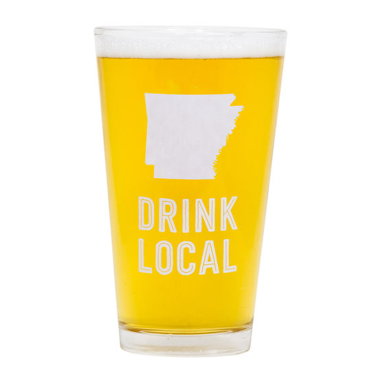 pint glass with Arkansas state shape and quote "drink local" on a white background