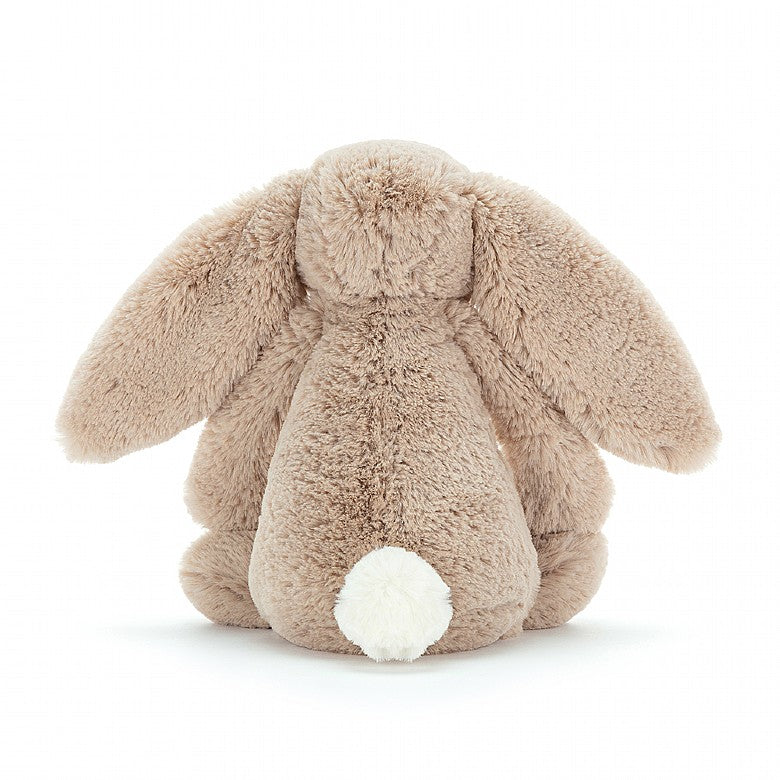 back view of the beige bashful bunny on a white background
