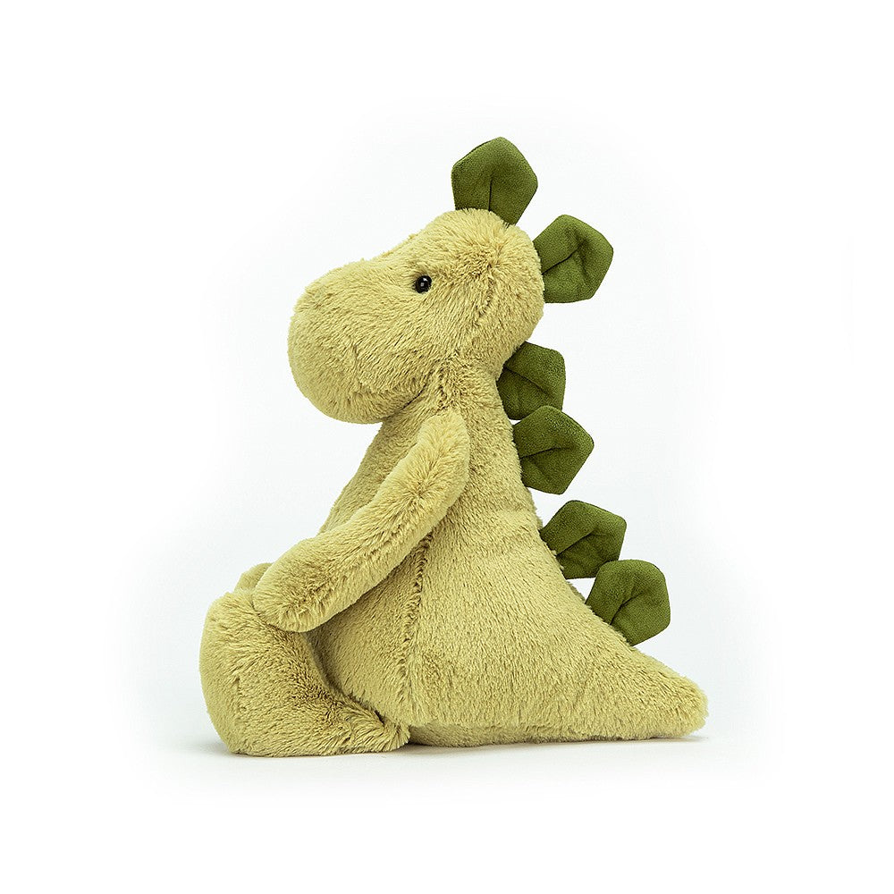 side view of bashful dinosaur on a white background