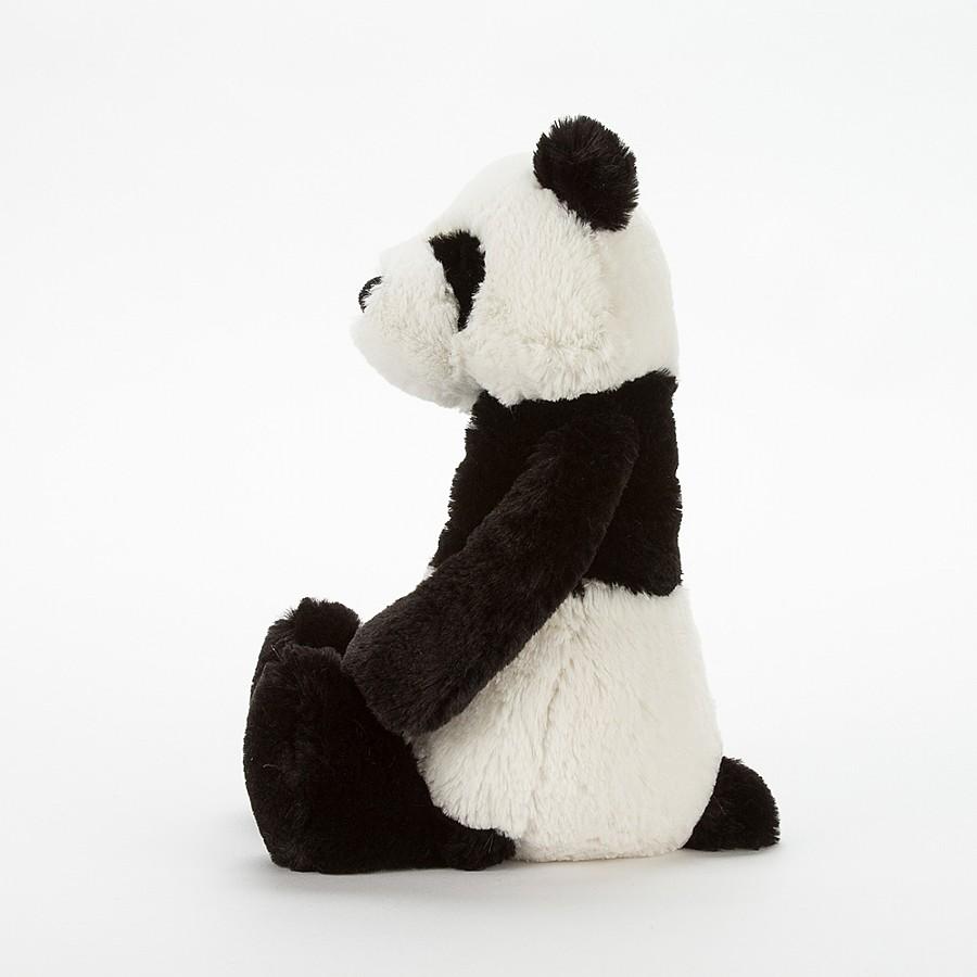 side view of the bashful panda on a white background