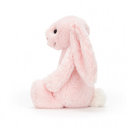 side view of the blush bashful bunny on a white background