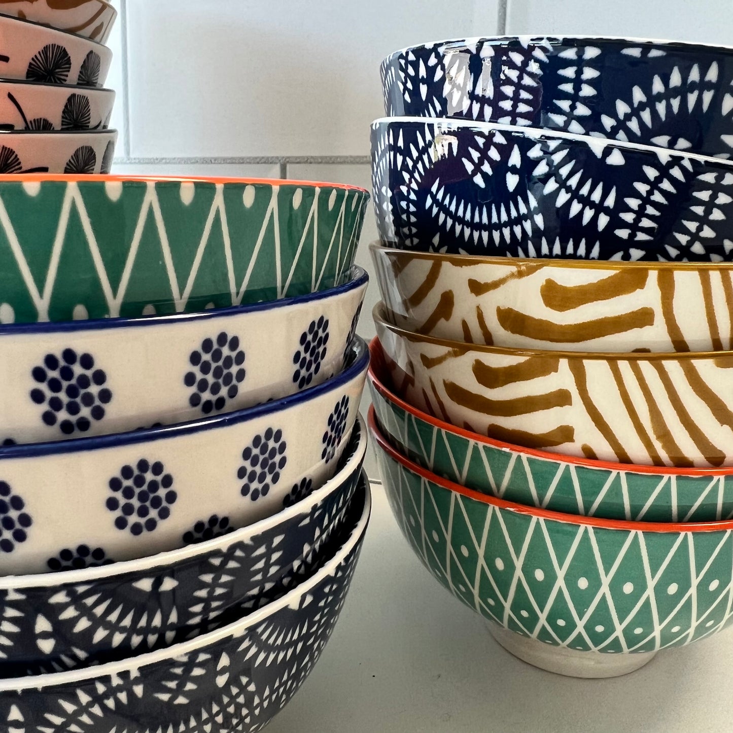 close-up of stacks of bowls on a countertop.
