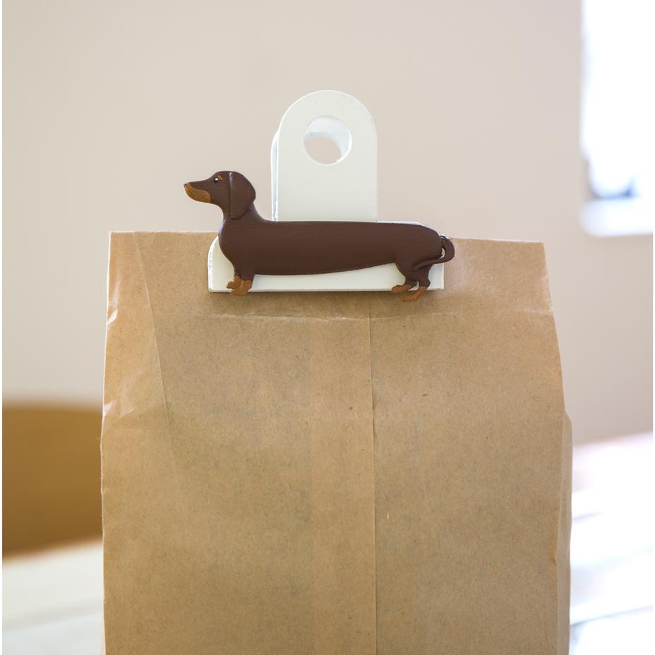 dog bag clip on a brown paper bag.