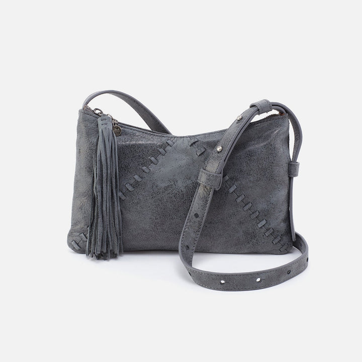 front view of the grey whipstitch paulette small crossbody on a white background