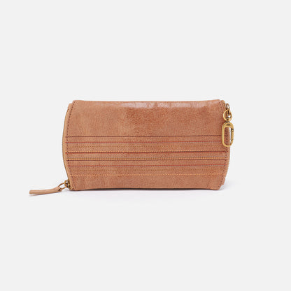 tan spark glasses case with stitching along the center on a white background.