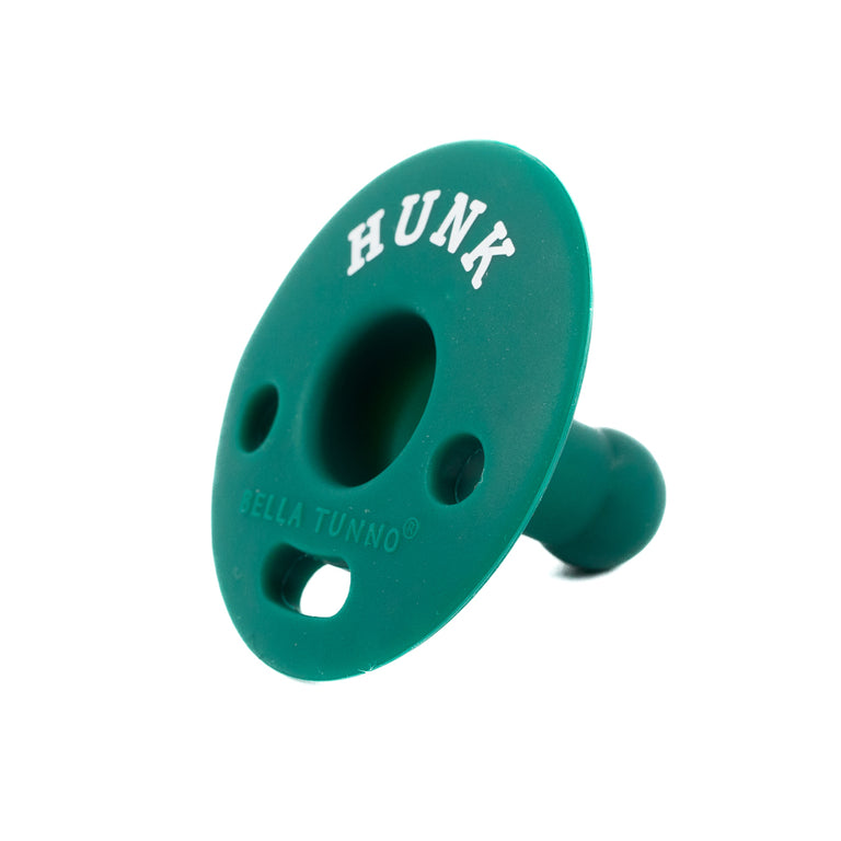 side view of the green hunk bubbi pacifier on a white background
