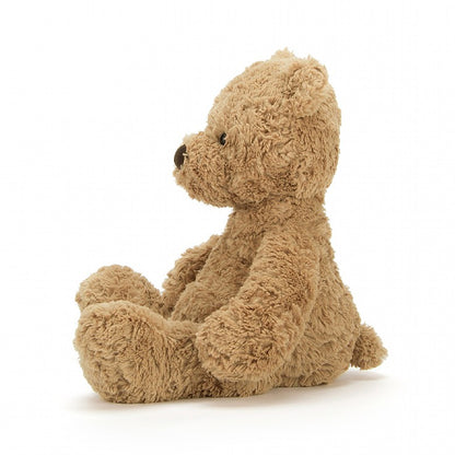 side view of bumbly bear on a white background