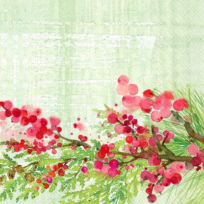 light green watercolor napkin with greenery and red berries along the bottom.