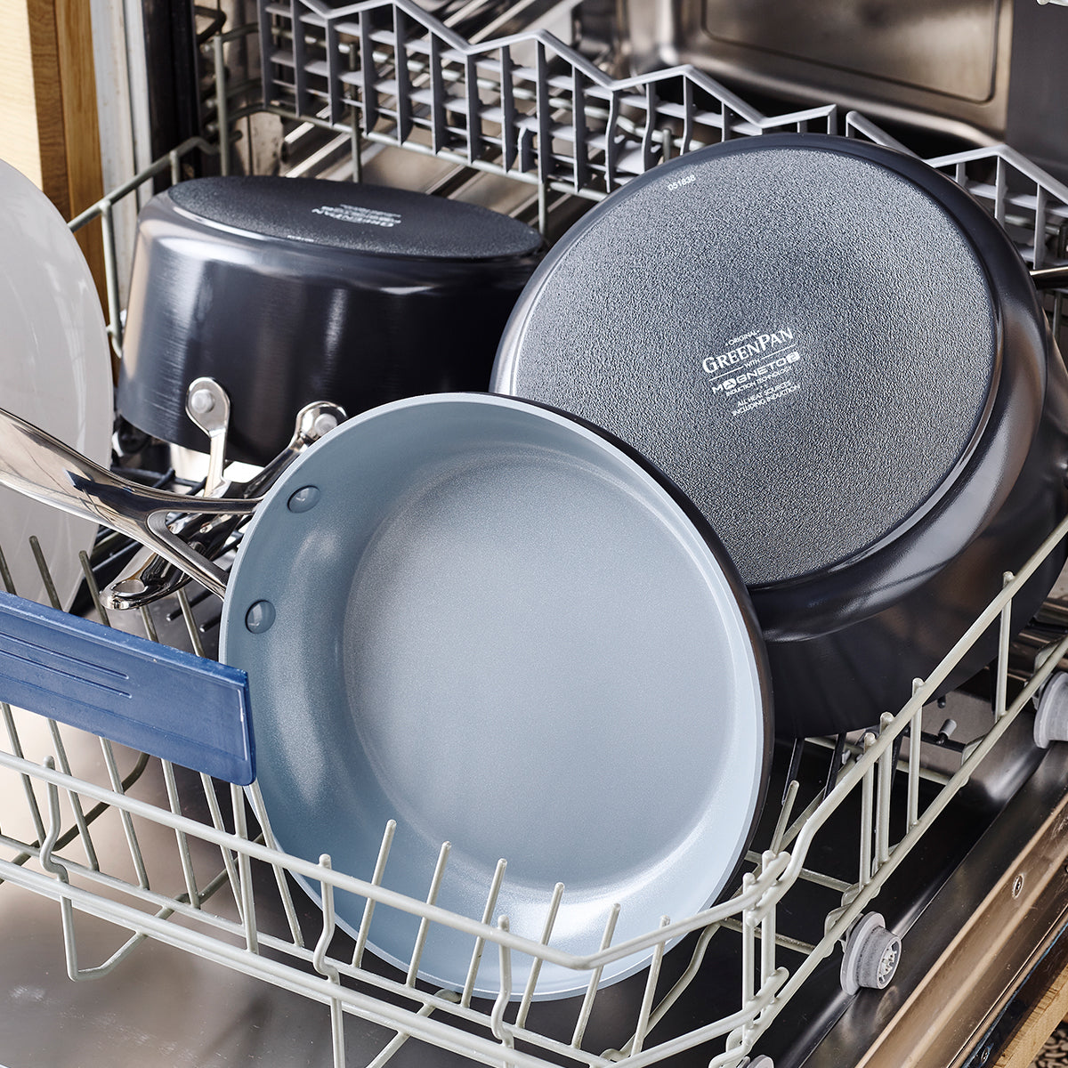 cookware in open dishwasher.