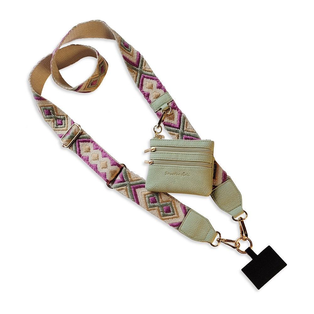 green and purple clip and go strap against a white background