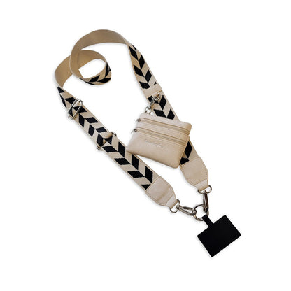 black and cream chevron clip and go strap against a white background