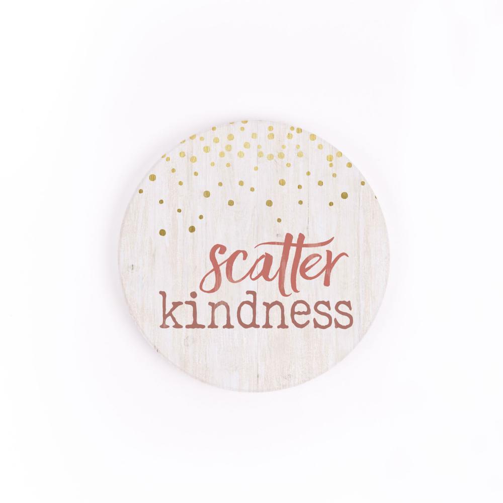 scatter kindness car coaster is white with gold dots and pink text displayed on a white background