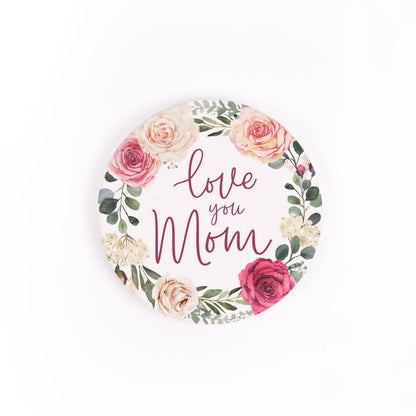 love you mom car coaster is white with a wreath of pale pink and dark pink roses and greenery and text in dark pink displayed on a white background