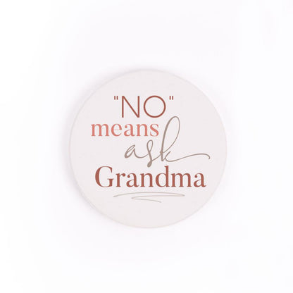 no means ask grandma car coaster is white with red, pink, and gray text and displayed on a white background