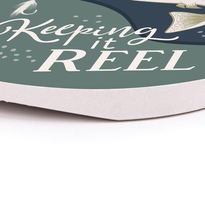 close up angled view of the keeping it reel car coaster on a white surface